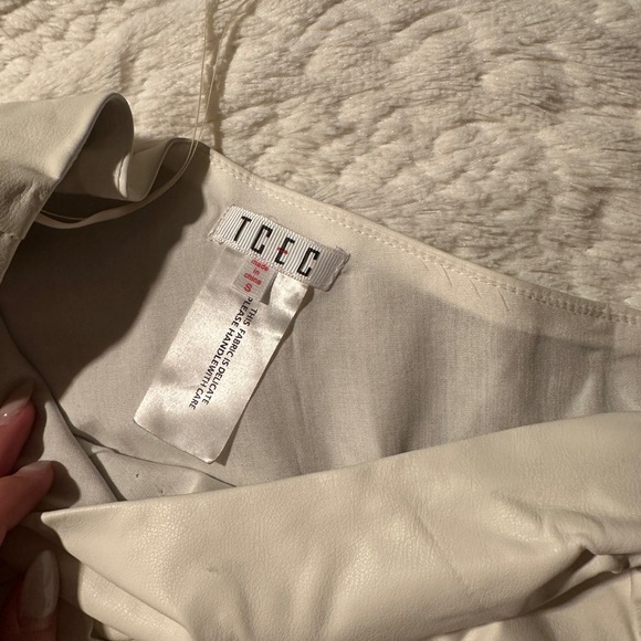 Asymmetrical leather romper - Picture 2 of 5